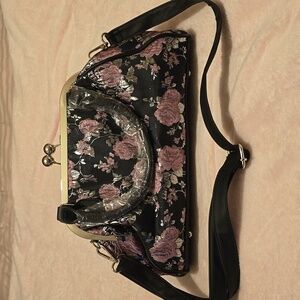 Black, pink, and silver kiss lock purse by Dollskill